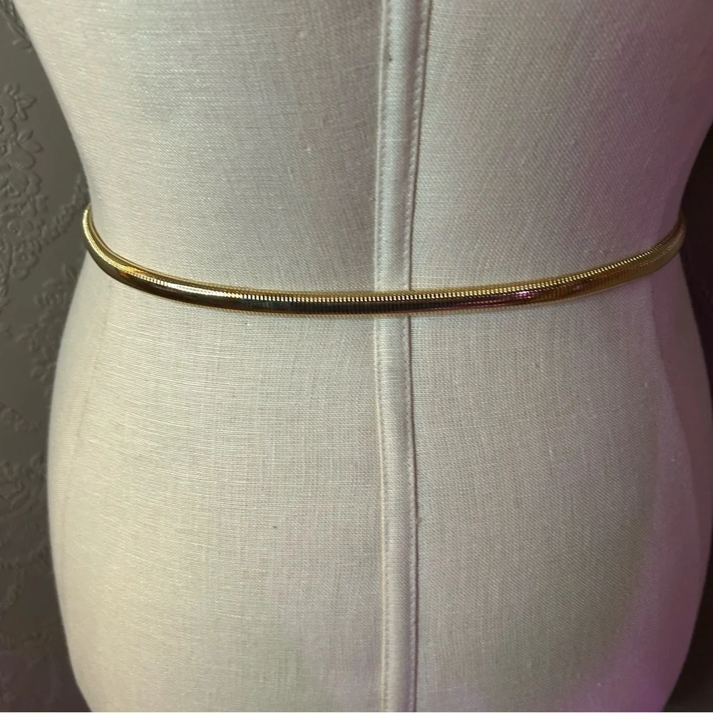 Elegant Gold Women's hedgehog belt approx 26” unstretched